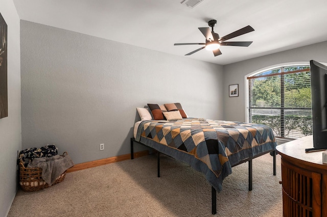 143 Shady Woods Ln, Denison, TX 75021 - carpeted bedroom featuring ceiling fan and baseboards