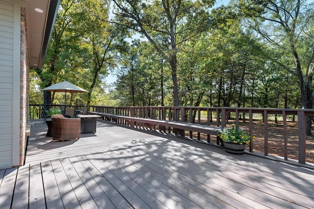 143 Shady Woods Ln, Denison, TX 75021 - wooden deck featuring outdoor dining area