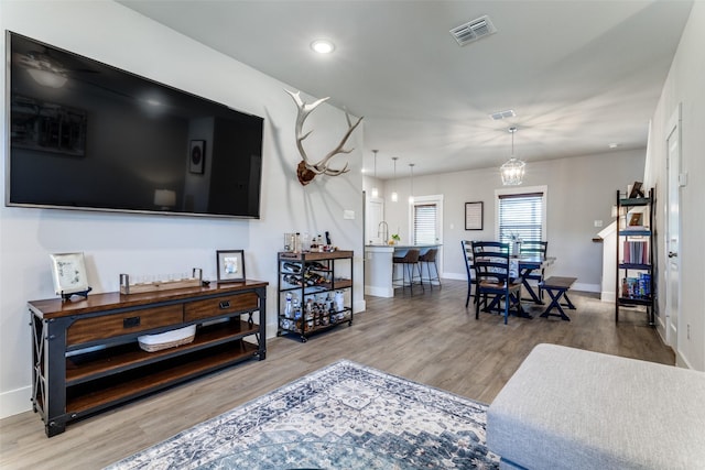 8916 Holt St, Lakeside, TX 76135 - living area featuring wood finished floors and recessed lighting