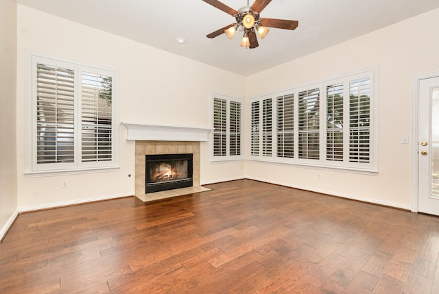 2248 Amy Ln, Plano, TX 75074 - unfurnished living room with a ceiling fan, wood finished floors, and a tile fireplace