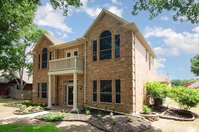 2248 Amy Ln, Plano, TX 75074 - view of front of house with a balcony and brick siding