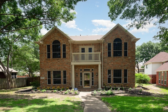 2248 Amy Ln, Plano, TX 75074 - view of front of house with a balcony and brick siding
