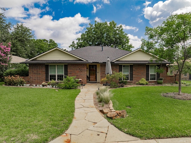 325 Los Santos Dr, Garland, TX 75043 - ranch-style house featuring brick siding, a front lawn, and roof with shingles