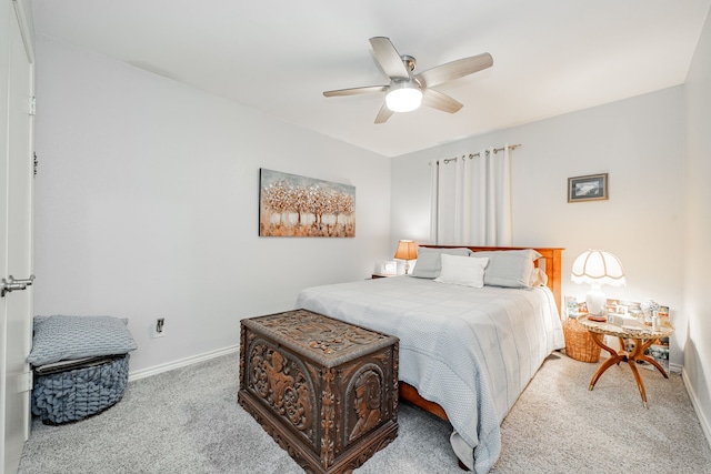 325 Los Santos Dr, Garland, TX 75043 - carpeted bedroom featuring baseboards and ceiling fan