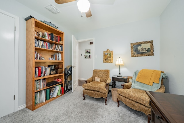 325 Los Santos Dr, Garland, TX 75043 - living area with carpet floors and ceiling fan