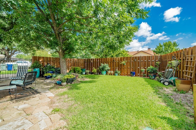 325 Los Santos Dr, Garland, TX 75043 - fenced backyard featuring a patio area