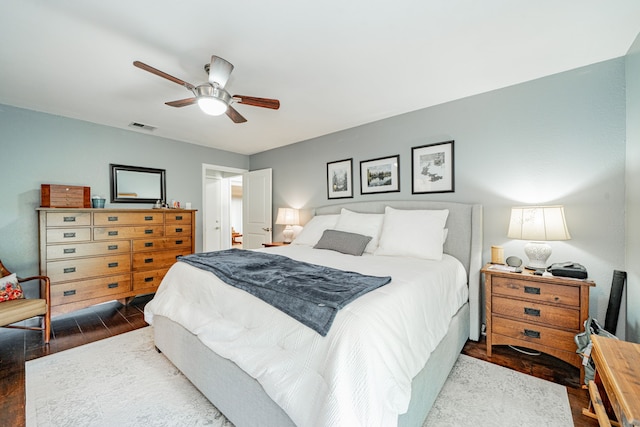 325 Los Santos Dr, Garland, TX 75043 - bedroom featuring dark wood-type flooring and a ceiling fan