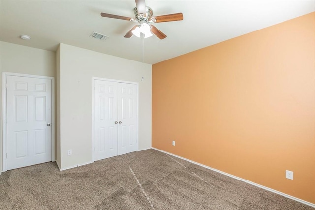 6600 Cascade Dr, Waco, TX 76712 - unfurnished bedroom featuring a closet, carpet, and ceiling fan