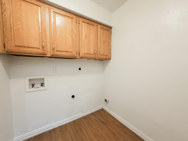 820 Via Madonna, Mesquite, TX 75150 - laundry room with electric dryer hookup, cabinet space, hookup for a washing machine, and wood finished floors