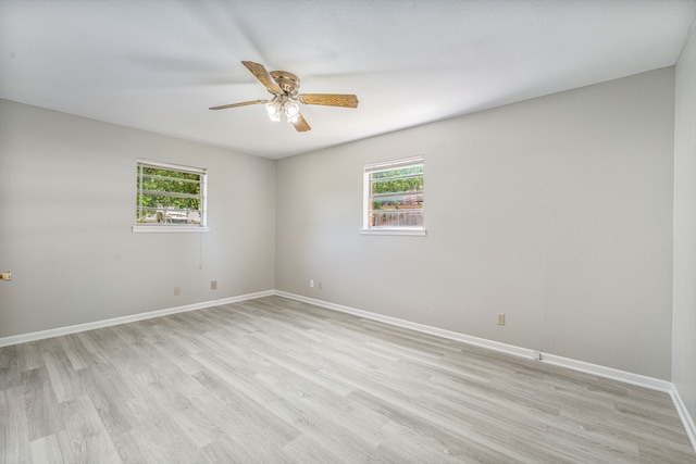 1016 Meadowlark Ln, Stephenville, TX 76401 - empty room with plenty of natural light, light wood-type flooring, and a ceiling fan