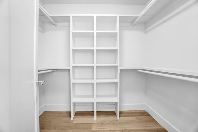 301 E Wall St, Grapevine, TX 76051 - spacious closet with wood finished floors