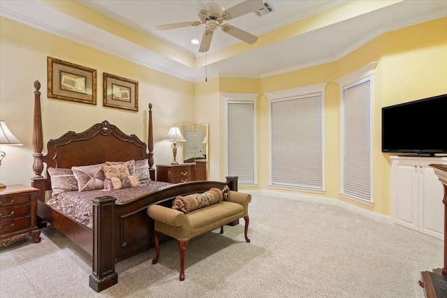 1313 Windstone Dr, Waco, TX 76712 - bedroom featuring light colored carpet, crown molding, a raised ceiling, and ceiling fan
