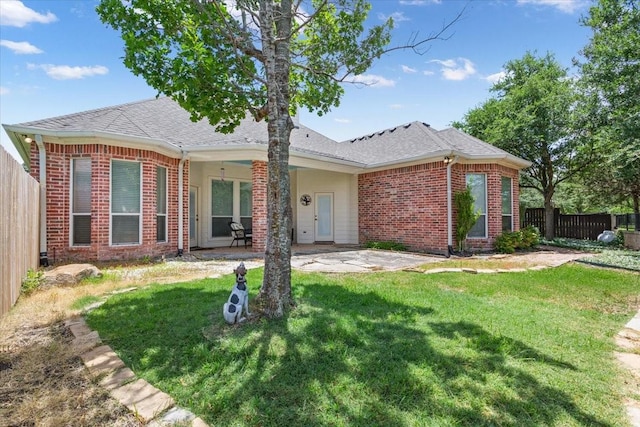 1313 Windstone Dr, Waco, TX 76712 - view of front of property with brick siding, a patio area, and roof with shingles