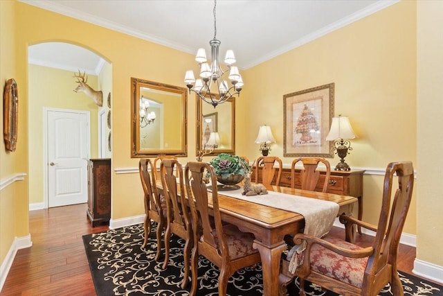 1313 Windstone Dr, Waco, TX 76712 - dining space featuring a chandelier, wood-type flooring, arched walkways, and ornamental molding