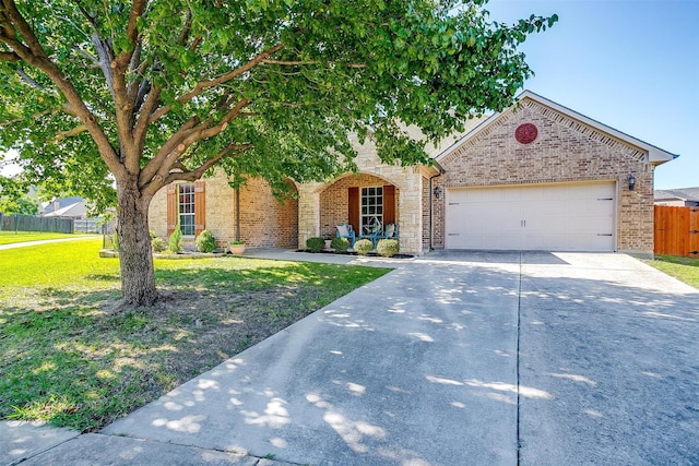 1201 Claire Ct, Burleson, TX 76028 - view of front of property with driveway, a garage, and brick siding