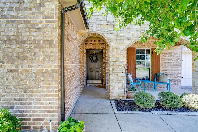 1201 Claire Ct, Burleson, TX 76028 - view of exterior entry featuring brick siding and stone siding
