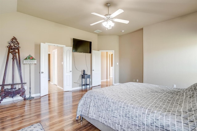 1201 Claire Ct, Burleson, TX 76028 - bedroom featuring light wood-style floors, lofted ceiling, and a ceiling fan