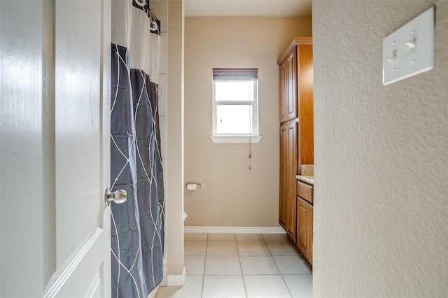 1201 Claire Ct, Burleson, TX 76028 - bathroom with vanity, tile patterned floors, and a shower with shower curtain