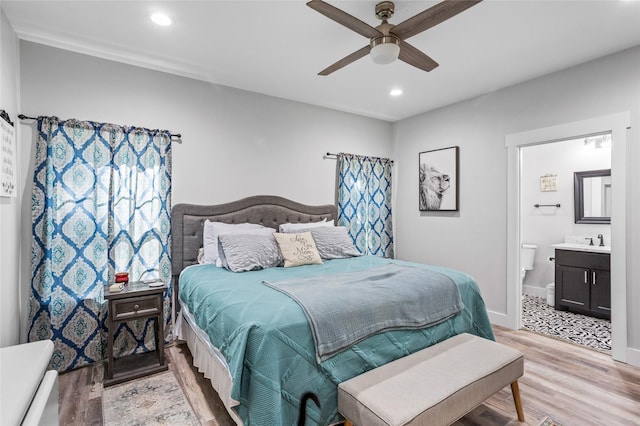 1685 Fleming Rd, Bells, TX 75414 - bedroom with light wood-type flooring, recessed lighting, ensuite bathroom, and a ceiling fan