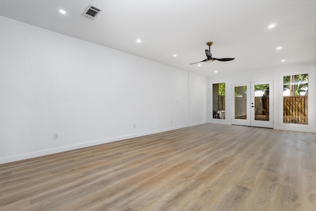 4942 Thunder Rd, Dallas, TX 75244 - unfurnished room with recessed lighting, a ceiling fan, healthy amount of natural light, french doors, and light wood finished floors