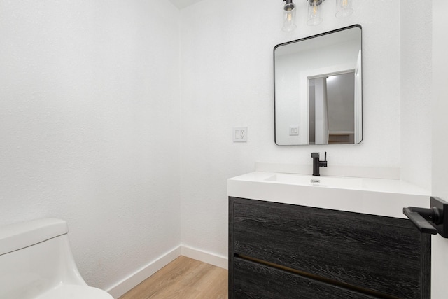 4942 Thunder Rd, Dallas, TX 75244 - bathroom with vanity and wood finished floors