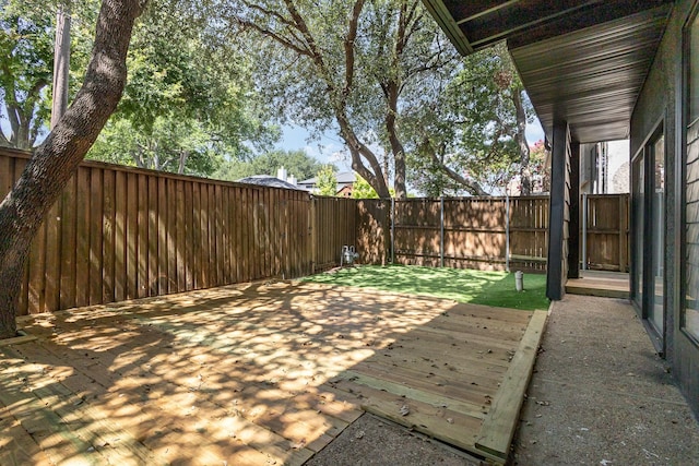 4942 Thunder Rd, Dallas, TX 75244 - fenced backyard with a wooden deck
