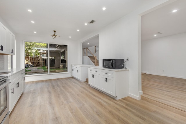 4942 Thunder Rd, Dallas, TX 75244 - unfurnished living room with light wood finished floors and recessed lighting