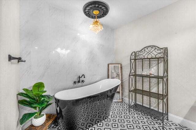 612 W Park Ave, Weatherford, TX 76086 - full bath featuring a soaking tub and baseboards