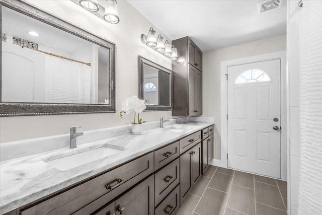 612 W Park Ave, Weatherford, TX 76086 - full bath with double vanity