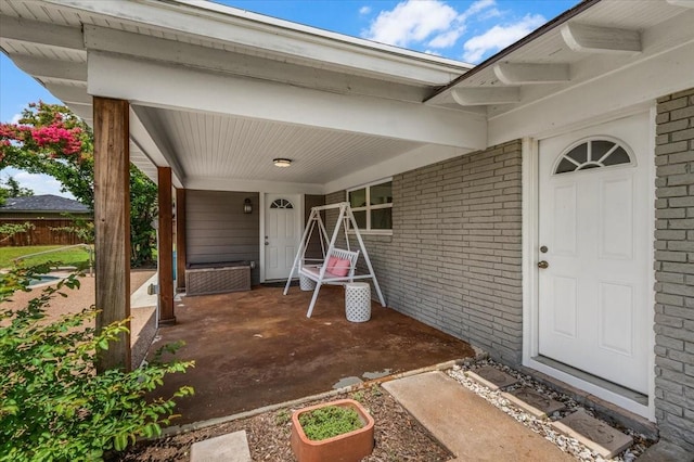 612 W Park Ave, Weatherford, TX 76086 - entrance to property with a porch and brick siding