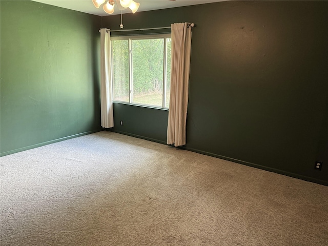 2015 E 5th St, Tyler, TX 75701 - spare room featuring carpet and ceiling fan