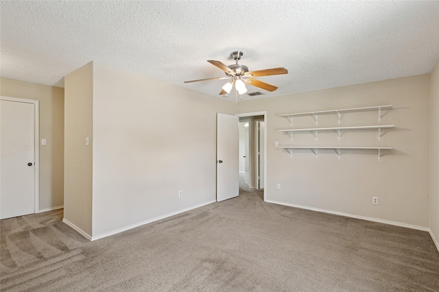 6569 Westridge Dr, Watauga, TX 76148 - unfurnished room with carpet flooring, a ceiling fan, and a textured ceiling