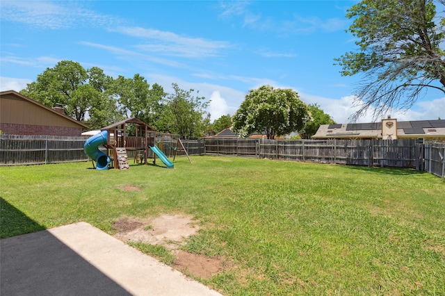 6569 Westridge Dr, Watauga, TX 76148 - fenced backyard featuring a playground