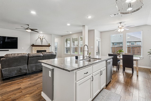 1813 Drover Creek Rd, Aubrey, TX 76227 - kitchen with a ceiling fan, stainless steel dishwasher, stone counters, dark wood-style flooring, and recessed lighting