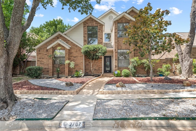 2707 Garden Springs Dr, Richardson, TX 75082 - traditional-style home featuring brick siding