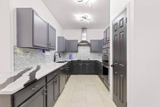 2707 Garden Springs Dr, Richardson, TX 75082 - kitchen featuring wall chimney exhaust hood, light marble finish flooring, backsplash, appliances with stainless steel finishes, and light stone counters