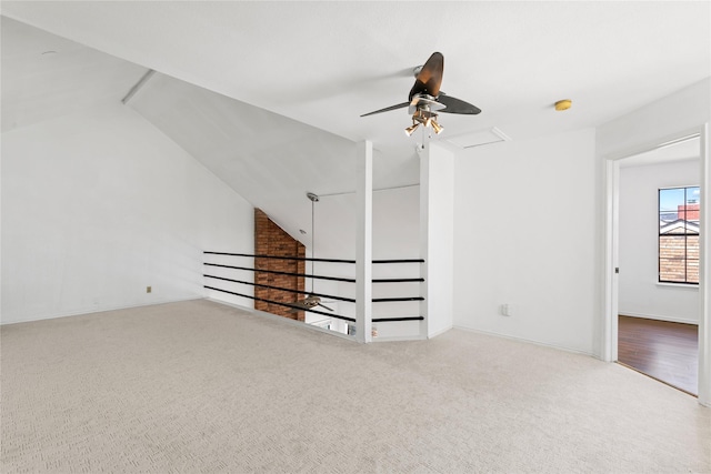 2707 Garden Springs Dr, Richardson, TX 75082 - spare room with carpet floors, a ceiling fan, vaulted ceiling, and a smoke detector