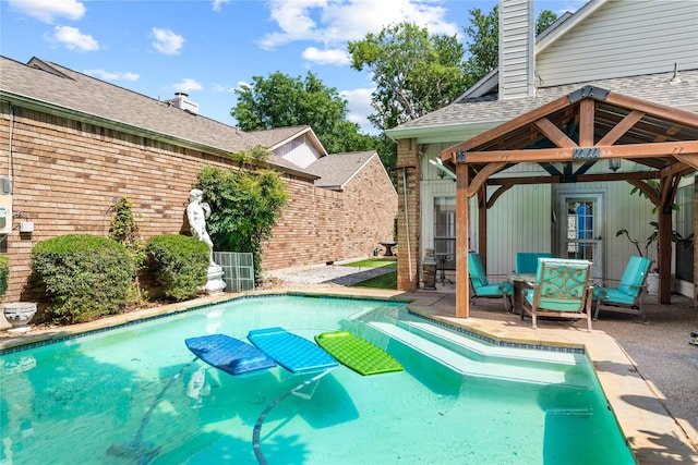 2707 Garden Springs Dr, Richardson, TX 75082 - view of swimming pool featuring a patio