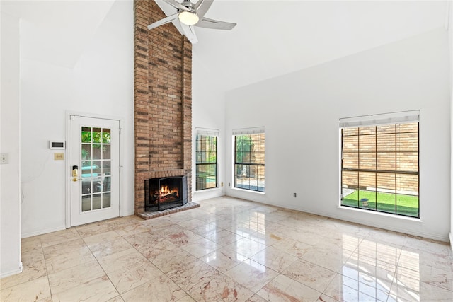 2707 Garden Springs Dr, Richardson, TX 75082 - unfurnished living room with high vaulted ceiling, marble tiled floors, ceiling fan, and a fireplace