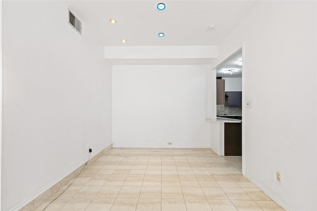 2707 Garden Springs Dr, Richardson, TX 75082 - spare room featuring recessed lighting and tile patterned floors