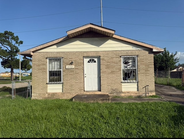 10450 Heritage, New Orleans, LA 70127 - bungalow featuring brick siding