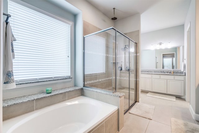 3300 Western Bluff Ct, Mansfield, TX 76063 - full bathroom featuring a stall shower, a bath, vanity, and plenty of natural light