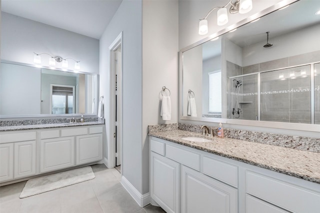 3300 Western Bluff Ct, Mansfield, TX 76063 - bathroom with a stall shower, vanity, and tile patterned flooring