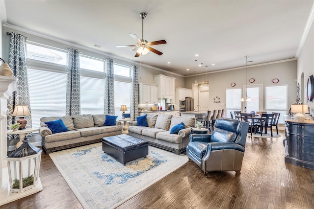 3300 Western Bluff Ct, Mansfield, TX 76063 - living room with a ceiling fan, dark wood finished floors, crown molding, and recessed lighting