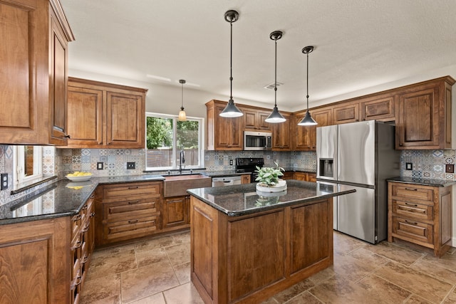 3312 John Ct N, Hurst, TX 76054 - kitchen with stainless steel appliances, brown cabinetry, decorative backsplash, a kitchen island, and dark stone countertops
