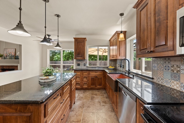 3312 John Ct N, Hurst, TX 76054 - kitchen with stainless steel dishwasher, decorative backsplash, hanging light fixtures, dark stone counters, and brown cabinets