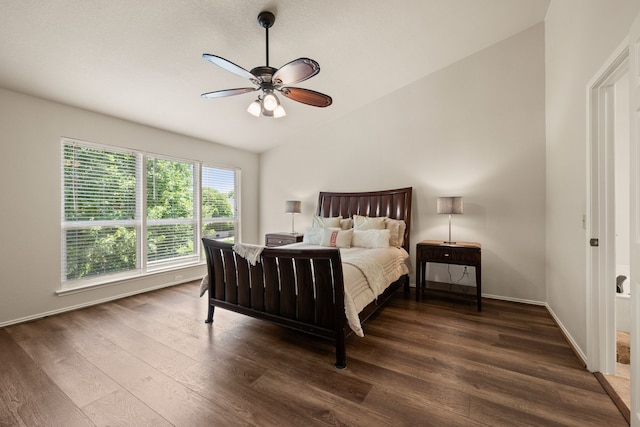 3312 John Ct N, Hurst, TX 76054 - bedroom featuring vaulted ceiling, dark wood-type flooring, and ceiling fan