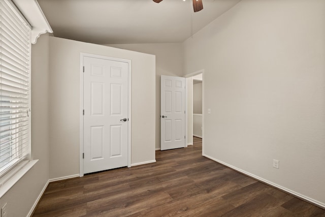 3312 John Ct N, Hurst, TX 76054 - unfurnished bedroom with lofted ceiling, dark wood-type flooring, and ceiling fan