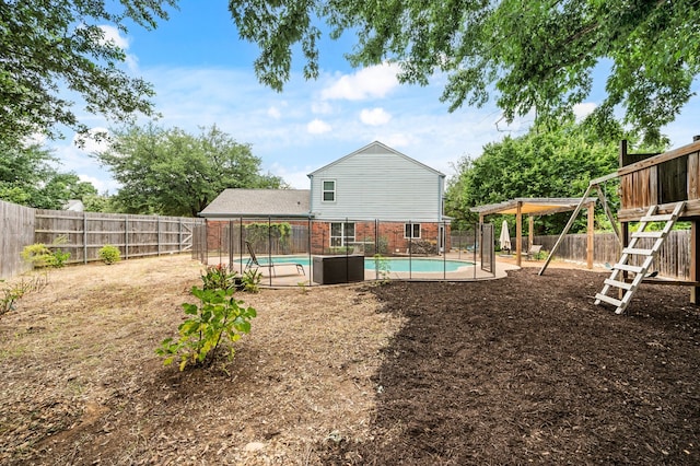 3312 John Ct N, Hurst, TX 76054 - back of house with a fenced backyard and brick siding