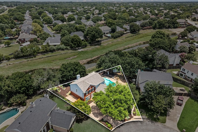 3312 John Ct N, Hurst, TX 76054 - aerial perspective of suburban area featuring a pool area and property parcel outlined